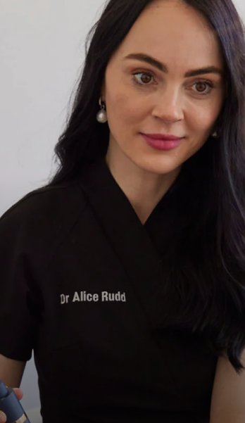 Dr Alice Rudd consulting with a patient about skin health and personalised skincare.