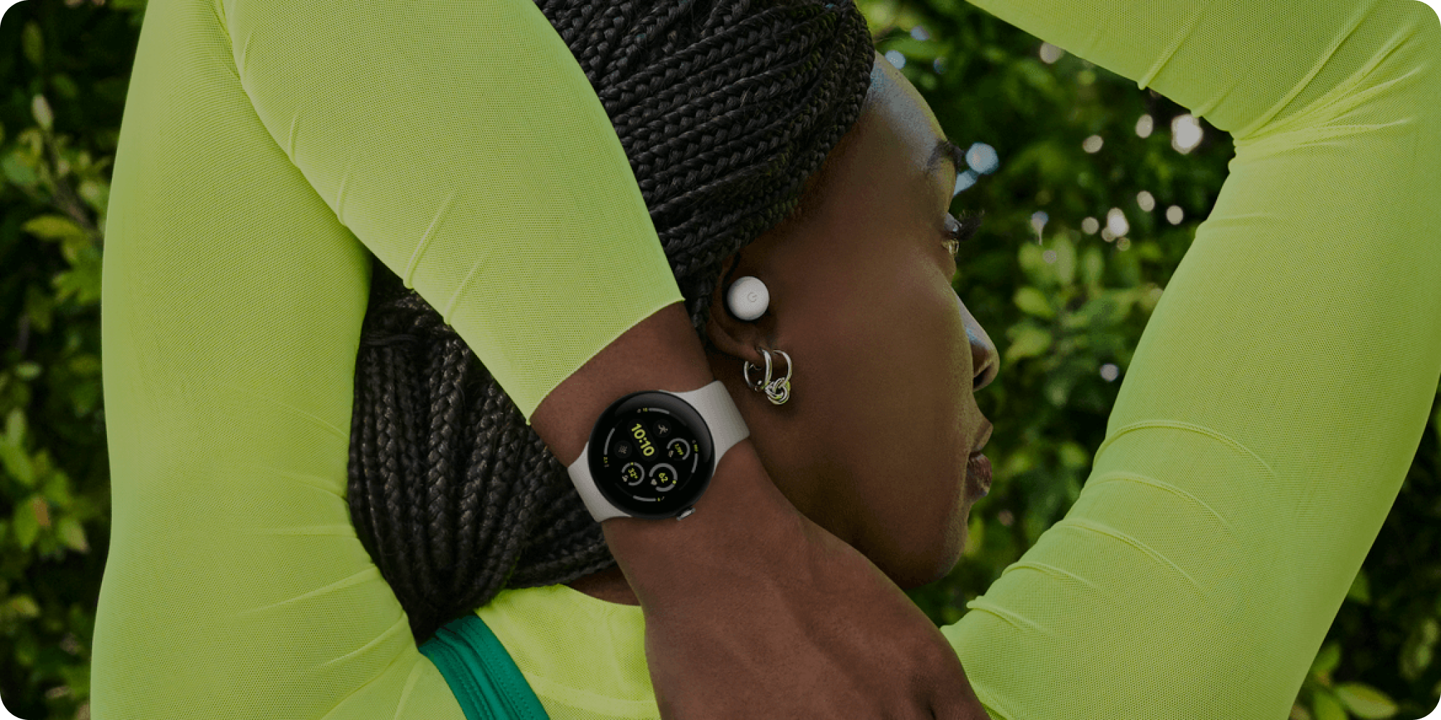 Woman stretching inside while wearing Samsung Galaxy Watch.