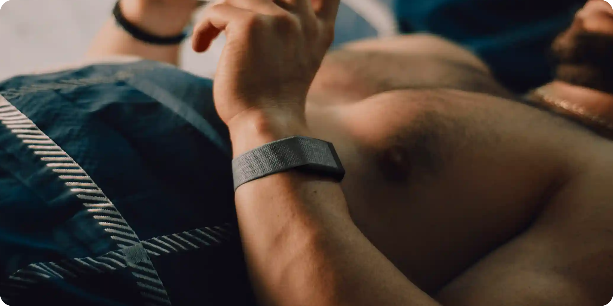 A man wearing a WHOOP strap, with overlaid skin insight cards showing sleep, training stress and immunity scores